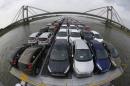 Newly manufactured Ford Fiesta cars are seen on the deck of the car transport ship "Tossa" as it travels along the Rhine, from a Ford plant in the German city of Cologne