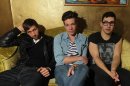 In this March 1, 2012 photo, the members of fun., from left, Andrew Dost, Nate Ruess, and Jack Antonoff pose for a photo in the green room after a performance at Lupo's Heartbreak Hotel in Providence, R.I. Fun., is now on a North American tour that wraps up June 16 in New York City. (AP Photo/Stew Milne)