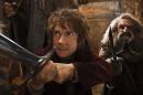 This image released by Warner Bros. Pictures shows Martin Freeman, left, and John Callen in a scene from "The Hobbit: The Desolation of Smaug."The Hobbit: The Desolation of Smaug" continued to top the box office, landing at No. 1 over the Christmas holiday for the third weekend in a row. (AP Photo/Warner Bros. Pictures, Mark Pokorny)