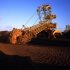 Australian PM Julia Gillard has cited a record bid for a coal firm as proof a carbon tax will not kill the industry