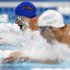 Ryan Lochte (L) swims in the men's 200m individual medley final against Micahel Phelps during the U.S. Olympic swimming trials in Omaha