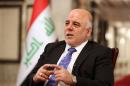 Iraq's Prime Minister Haider al-Abadi speaks during an interview with The Associated Press in Baghdad, Iraq, Wednesday, Sept. 17, 2014. Iraq's new prime minister says foreign ground troops are neither necessary nor wanted in his country's fight against the Islamic State group. (AP Photo/Hadi Mizban)