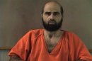Nidal Hasan, charged with killing 13 people and wounding 31 in a November 2009 shooting spree at Fort Hood, Texas, is pictured in an undated Bell County Sheriff's Office photograph. REUTERS/Bell County Sheriff's Office/Handout