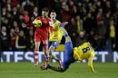 Southampton's Adam Lallana, left, competes for the ball with Arsenal's Mikel Arteta, right, during the English Premier League soccer match between Southampton and Arsenal at St Mary's stadium in Southampton, Tuesday, Jan. 28, 2014. (AP Photo/Matt Dunham)