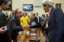 Secretary of State John Kerry, right, speaks with House Foreign Affairs Committee ranking member Rep. Eliot Engel, D-N.Y., on Capitol Hill in Washington, Thursday, Sept. 18, 2014, after a House Foreign Affairs Committee hearing. At the hearing, Kerry sought to push back on an argument by some in Congress that Syria's rebels lack moderates, or at least any with the capacity to make a difference in the war. (AP Photo/Carolyn Kaster)