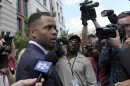 Former Illinois Rep. Jesse Jackson Jr., leaves federal court in Washington, Wednesday, Aug. 14, 2013. Jackson was sentenced to two and a half years in prison Wednesday after pleading guilty to scheming to spend $750,000 in campaign funds on TV's, restaurant dinners, an expensive watch and other costly personal items. His wife received a sentence of one year. (AP Photo/Susan Walsh)
