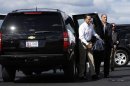 Republican presidential candidate Mitt Romney gets out of his vehicle as he boards his campaign charter plane in Bedford, Mass., Monday, Sept. 10, 2012. (AP Photo/Charles Dharapak)
