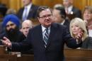 Canada's Finance Minister Flaherty speaks during Question Period in the House of Commons on Parliament Hill in Ottawa