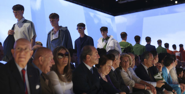 Models wear creations for Salvatore Ferragamo men's Spring-Summer 2014 collection, part of the Milan Fashion Week, unveiled in Milan, Italy, Sunday, June 23, 2013. (AP Photo/Luca Bruno)