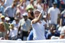 Ekaterina Makarova, of Russia, reacts after defeating Victoria Azarenka, of Belarus, in two sets during the quarterfinals of the 2014 U.S. Open tennis tournament, Wednesday, Sept. 3, 2014, in New York. (AP Photo/Mike Groll)