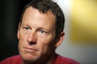 FILE - In this Feb. 15, 2011, file photo, Lance Armstrong pauses during an interview in Austin, Texas. Armstrong said on Thursday, Aug. 23, 2012, that he is finished fighting charges from the United States Anti-Doping Agency that he used performance-enhancing drugs during his unprecedented cycling career, a decision that could put his string of seven Tour de France titles in jeopardy. (AP Photo/Thao Nguyen, File)
