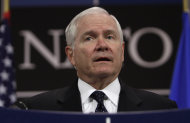 U.S. Defense Secretary Robert Gates speaks during a media conference after a meeting of NATO defense ministers at NATO headquarters in Brussels on Thursday, June 9, 2011. NATO defense ministers shift their focus from Libya to Afghanistan during talks on Thursday. (AP Photo/Virginia Mayo)