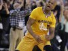 Golden State Warriors' Jarrett Jack reacts after scoring against the San Antonio Spurs during the second half of an NBA basketball game Friday, Feb. 22, 2013, in Oakland, Calif. (AP Photo/Ben Margot)