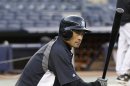 Suzuki of New York Yankees waits for his turn before Game 1 of MLB ALCS playoff baseball series against Detroit Tigers at Yankee Stadium in New York