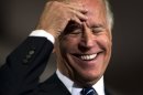 Vice President Joe Biden laughs during a campaign rally at Lakewood High School, Sunday, Nov. 4, 2012, in Lakewood, Ohio. (AP Photo/Matt Rourke)