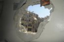 A view shows wreckage of a house after mortar bombs landed on the Mezze area in Damascus