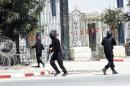 Tunisian security forces secure the area after gunmen attacked the famed Bardo Museum on March 18, 2015