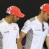 McLaren Formula One driver Lewis Hamilton and his teammate Jenson Button of Britain attend a news conference at the Suzuka circuit October 4, 2012, ahead of Sunday's Japanese F1 Grand Prix