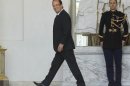 French President Francois Hollande smiles after his weekly cabinet meeting in Elysee Palace, Paris, Wednesday, June 6, 2012. (AP Photo/Jacques Brinon)