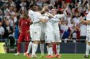 England's Daniel Sturridge, centre celebrates with his teammates after scoring during the international friendly soccer match between England and Peru at Wembley Stadium in London, Friday, May 30, 2014. (AP Photo/Matt Dunham)