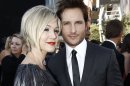 FILE - In this June 24, 2010 file photo, actress Jennie Garth, left, and her husband actor Peter Facinelli arrive at the premiere of 