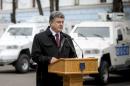 Ukrainian President Poroshenko attends a ceremony to hand over armoured vehicles to OSCE in Kiev