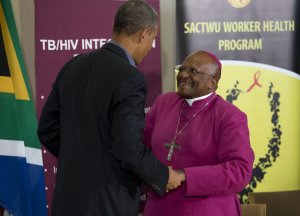 U.S. President Barack Obama, left, talks with Bishop …