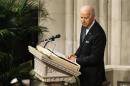 Biden delivers a tribute during the National Memorial Service for Nelson Mandela at the National Cathedral in Washington
