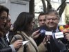 Greek Finance Minister Evangelos Venizelos, right, speaks to the press after a meeting with the Greek President Karolos Papoulias in Athens Wednesday, Feb. 15, 2012.  Greece's finance minister said that  all pending issues in its international creditors' requirements for the country's second bailout will be completed ahead of a Wednesday evening conference call between eurozone finance ministers. Venizelos made the comments after a meeting with President Karolos Papoulias, who he said will give up his presidential salary to help in the crisis.(AP Photo/Petros Giannakouris)