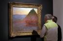 Claude Monet's "Meule" is displayed at Christie's, in New York, Friday, Nov. 4, 2016. Painted in 1891, the oil on canvas is estimated in the region of $45 million. (AP Photo/Richard Drew)