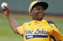 Chicago's Joshua Houston delivers in the first inning of a United States Championship game against Las Vegas at the Little League World Series tournament in South Williamsport, Pa., Saturday, Aug. 23, 2014. (AP Photo/Gene J. Puskar)
