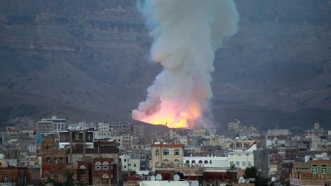 Smoke billows following an air-strike by Saudi-led coalition warplanes on Huthi rebels in Sanaa, on May 11, 2015