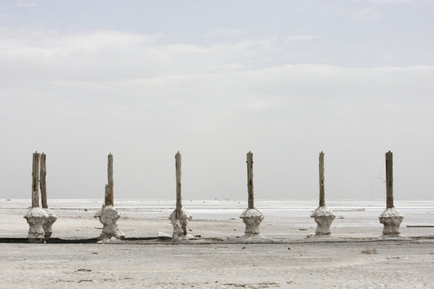 Pillars of an abandoned jetty are seen in the solidified salts of the Oroumieh Lake, some 370 miles (600 kilometers) northwest of the capital Tehran, Iran, Friday, April 29, 2011. (AP Photo/Vahid Sale