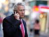 CEO, Chairman, and Co-founder of Chesapeake Energy Corporation McClendon walks through the French Quarter in New Orleans, Louisiana