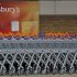 Shopping trolleys are lined up in front of a Sainsury's supermarket in London