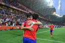 South Korea's Son Heung-Min (C) is congratulated by teammate Kim Jin Su (L) after scoring during their Asian Cup match against Uzbekistan in Melbourne on January 22, 2015