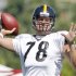 Pittsburgh Steelers quarterback Ben Roethlisberger wears the practice jersey of former teammate Max Starks during training camp at the NFL football team's practice facility in Latrobe, Pa., on Sunday, July 31, 2011. After practice, Roethlisberger said he saw the jersey in Stark's old locker and decided to wear it to honor him. (AP Photo/Keith Srakocic)