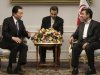 Former Japanese Prime Minister Yukio Hatoyama, left, speaks with Iranian President Mahmoud Ahmadinejad, during their meeting at the Iranian presidency office in Tehran, Iran, Sunday, April 8, 2012. An unidentified interpreter sits at center. (AP Photo/Vahid Salemi)