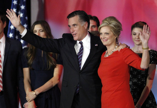 Republican presidential candidate and former Massachusetts Gov. Mitt Romney and his wife Ann Romney wave to supporters after Romney conceded the race at his election night rally, Wednesday, Nov. 7, 2012, in Boston. (AP Photo/Stephan Savoia)