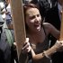Protesters shout slogans to demonstrate against the country's near 25 percent unemployment rate and stinging austerity measures introduced by the government, in Madrid, Spain, Saturday, July 21, 2012. (AP Photo/Andres Kudacki)