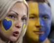 Fans of Ukraine cheer before their Group D Euro 2012 soccer match against England at Donbass Arena in Donetsk