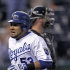 Kansas City Royals' Melky Cabrera runs past Chicago White Sox catcher Tyler Flowers on his solo home run during the first inning of a baseball game Thursday, Sept. 15, 2011, in Kansas City, Mo. (AP Photo/Charlie Riedel)