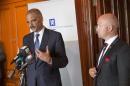 Norway's Minister of Justice Anders Anundsen, right, looks on as US Attorney General Eric Holder, speaks to the media in Oslo Tuesday July 8, 2014 . Holder is in Norway to make a major address on international efforts to confront the security threat posed by violent extremists traveling to and from Syria. (AP Photo/Terje Bendiksby/ NTB Scanpix)