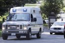 A Commonwealth of Massachusetts medical examiner's van leaves the Puritan Lawn Memorial Park in Peabody, Mass., after exhuming Albert DeSalvo's body from a grave to confirm a forensic link to the Boston Strangler case, Friday, July 12, 2013. DeSalvo was the man who first confessed to being the Boston Strangler, but later recanted before his stabbing death in prison as he served a life sentence for other crimes. (AP Photo/Charles Krupa)