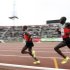 Wilson Kiprop of Kenya races against compatriot Matthew Kisorio during the 10,000m men's final race at the 2010 African Athletics Championship at the Nyayo stadium in the capital Nairobi