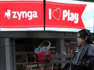 The corporate logo for Zynga is seen on a screen outside the Nasdaq Market Site in New York, December 16, 2011. REUTERS/Brendan McDermid