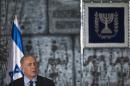 Israel's Prime Minister Netanyahu speaks before a group photo with the new Israeli government in Jerusalem