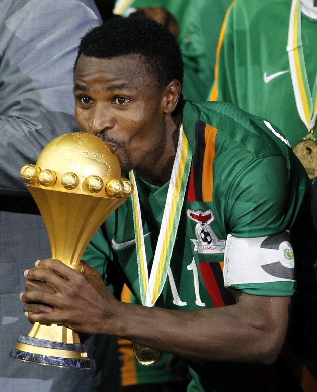 Zambia's captain Christopher Katongo kisses the trophy after winning the 2012 African Cup of Nations tournament's final match against Ivory Coast in Libreville