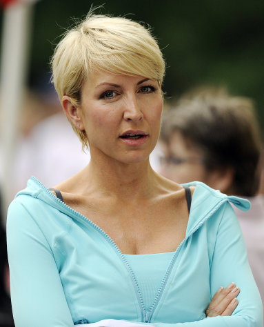 File - Heather Mills attends the Achilles Hope and Possibility Race in New York's Central Park in this June 27, 2010 file photo . Heather Mills took on Piers Morgan at Britain's media ethics inquiry, Thursday, Feb.9, 2012, where the ex-model trashed Morgan's earlier testimony, saying that one of her private voicemails, which was played to the CNN interviewer and former tabloid editor, could have been obtained only through phone hacking. (AP Photo/Stephen Chernin, File)