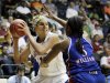 Delaware's Elena Delle Donne (11) is pressured by Kansas' Bunny Williams (5) during the second half of an NCAA tournament second-round women's college basketball game in Little Rock, Ark., Tuesday, March 20, 2012. Kansas defeated Delaware 70-64. (AP Photo/Danny Johnston)
